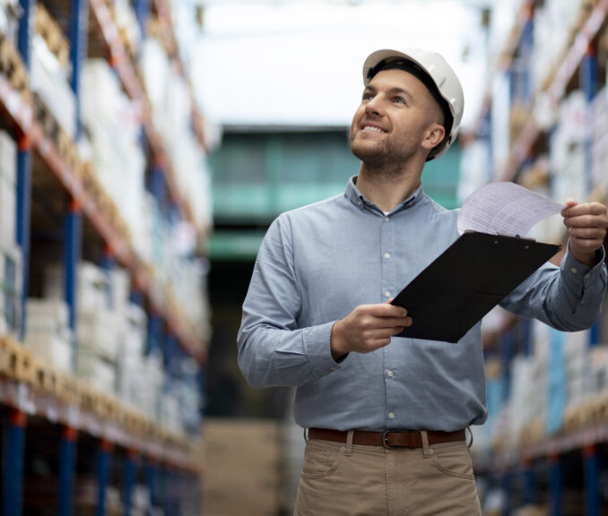 medium-shot-smiley-man-warehouse